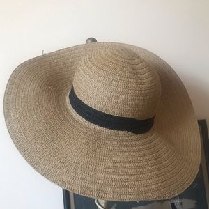 Tan Straw Beach hat with black ribbon detail